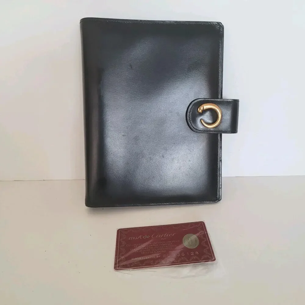 Cartier Black Leather Planner with Gold Panther Accent